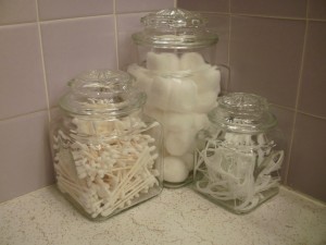 reusing old glass jars in the bathroom