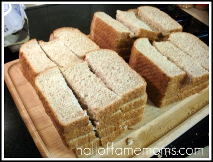 Cut bread vertically to make dipping sticks.