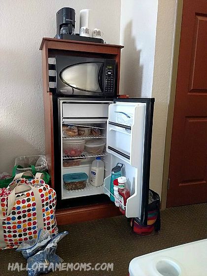 Spacious fridge for eating in our room.