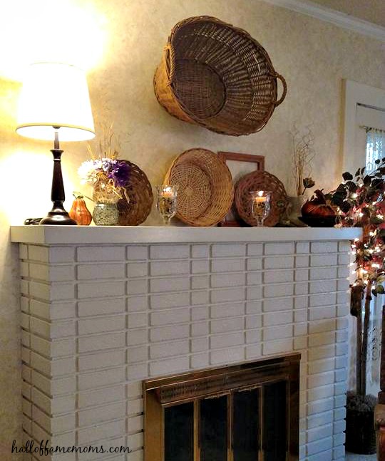 The after pic of decorating our fireplace mantel. #homedecor #frugal