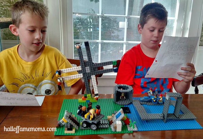 Reading their presentation at our home based Lego Club