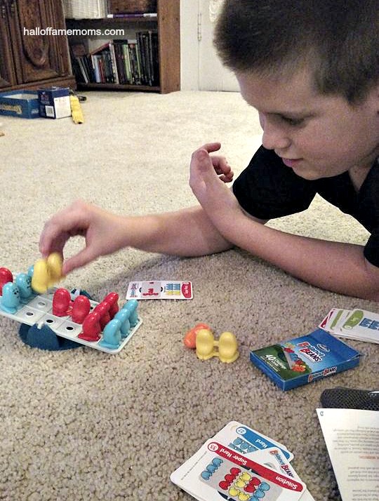 Playing Balance Beans by Thinkfun. See our family's list of favorite games here!