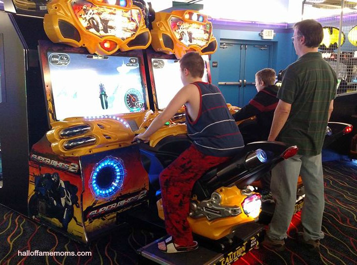 Playing in the arcade at Castaway Bay, Sandusky, Ohio.